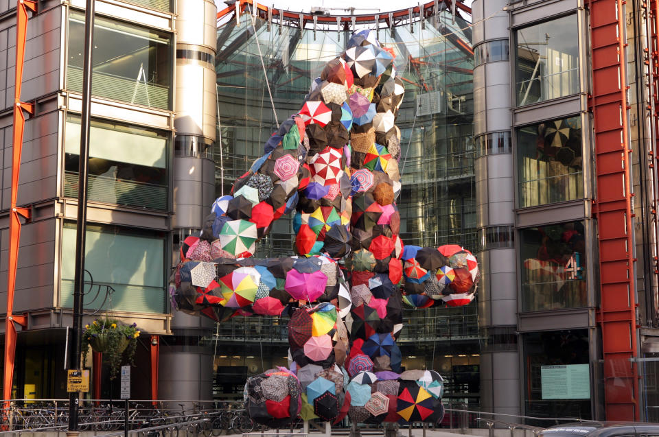 LONDON, ENGLAND - MARCH 4:  Art installation 'Shelter', a giant number 4 made from discarded umbrellas by artist Stephanie Imbeau, winner Channel 4's BIG4 public art competition, stands in front of the Channel 4 building on March 4, 2009 in London, England. The piece, a representation of channel 4's logo, is constructed from unconnected blocks so that it only appears as the number 4 from a certain viewpoint.  (Photo by Oli Scarff/Getty Images)