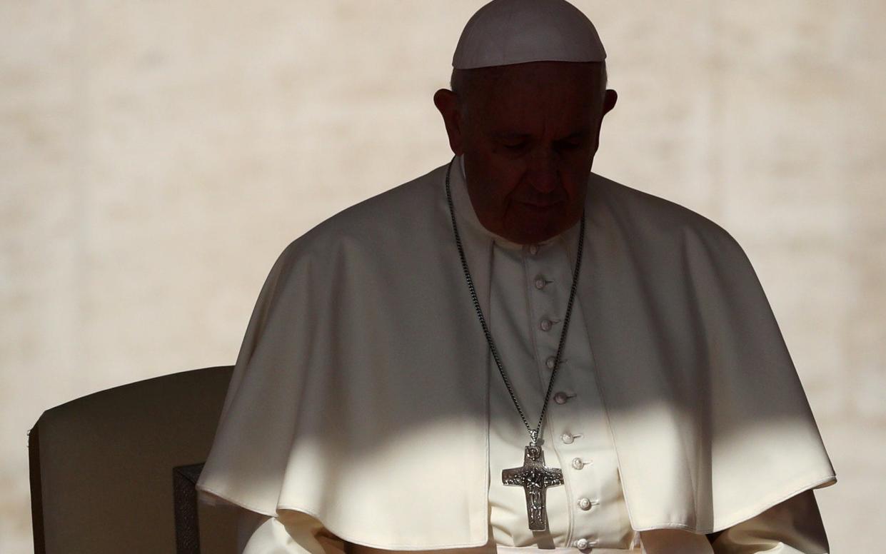 Pope Francis arrives at his weekly general audience  - REUTERS