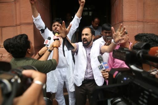 Members of Parliament representing Jammu and Kashmir, Rajya SabhaFayaz, Ahmad Mir and Nazir Ahmad Laway protest outside parliament in New Delhi