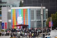 Journalists and attendees line up outside of Yerba Buena Center for the Arts in San Francisco to attend Apple's special media event. Apple on Wednesday introduced a new iPhone 5 with a bigger screen and slimmer body that analysts quickly branded a sure hit for the culture-changing tech giant