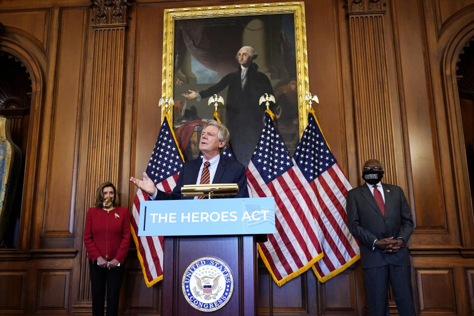 Chairman of the House Energy and Commerce Committee Rep. Frank Pallone, D-N.J., center, speaks next to House Speaker Nancy Pelosi of Calif., left, and House Majority Whip James Clyburn, of S.C., during a news conference about COVID-19, Thursday, Sept. 17, 2020, on Capitol Hill in Washington. (AP Photo/Jacquelyn Martin)