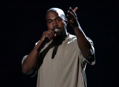 FILE PHOTO: Kanye West accepts the Video Vanguard Award at the 2015 MTV Video Music Awards in Los Angeles, California, August 30, 2015.  REUTERS/Mario Anzuoni/File Photo