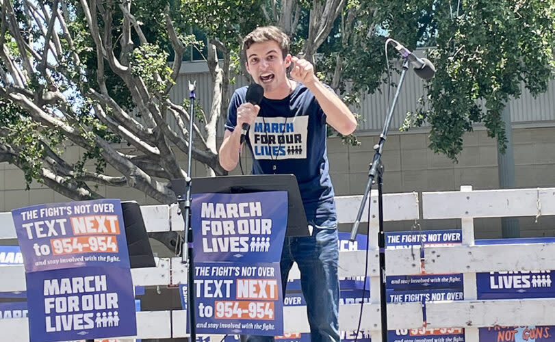 Cameron Kasky, a survivor of the 2018 shooting at Marjory Stoneman Douglas High School, spoke several times during Saturday’s march in downtown Los Angeles. (Linda Jacobson)