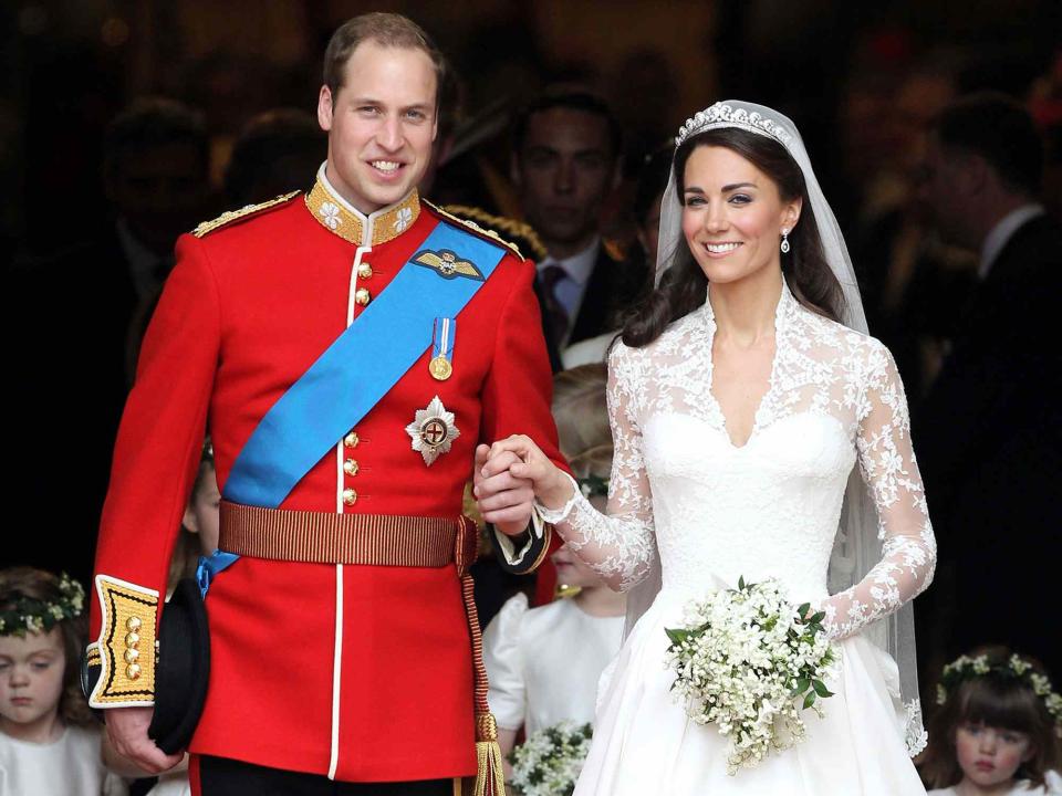 <p>Chris Jackson/Getty</p> Prince William, Duke of Cambridge and Catherine, Duchess of Cambridge smile following their marriage at Westminster Abbey on April 29, 2011 in London, England.