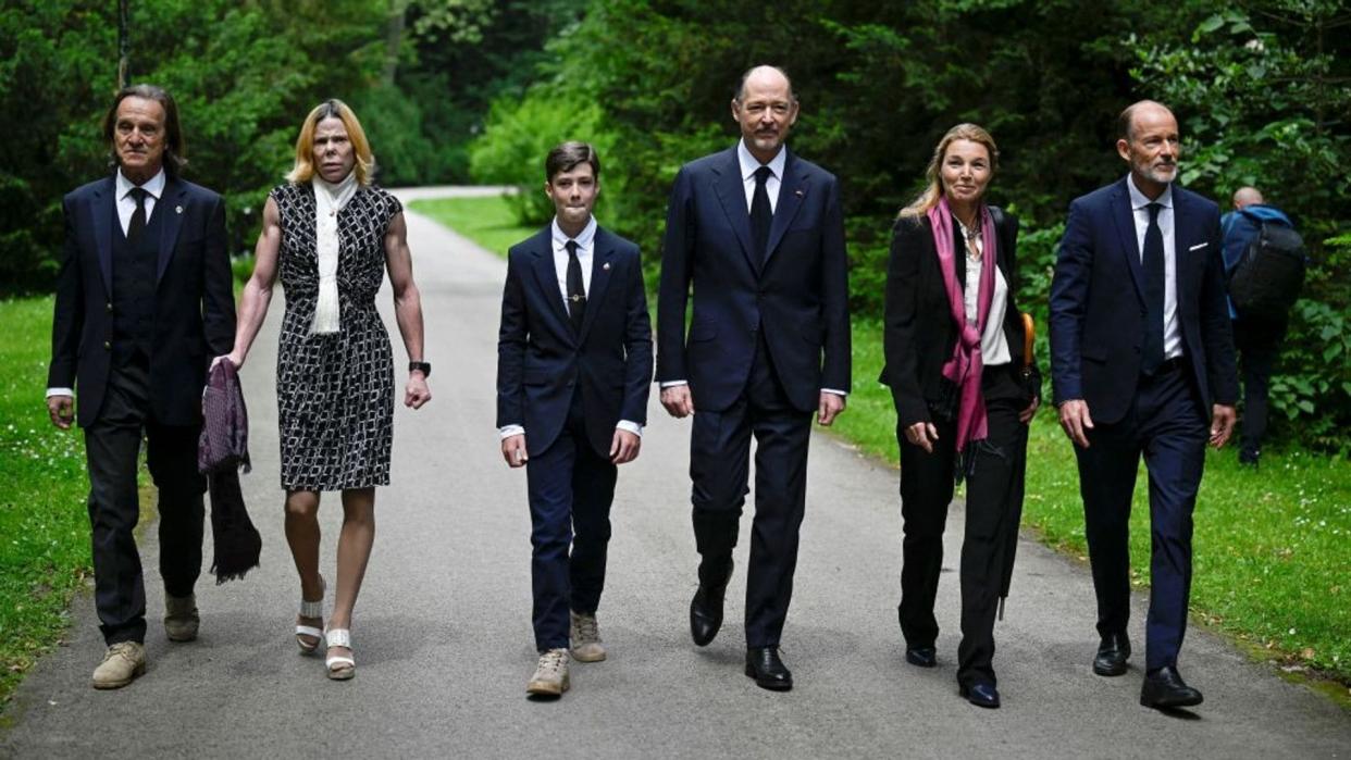 (R/L): Bulgaria's Prince Kyril of Preslav, Rosario Nadal, Prince Konstantin-Assen of Vidin, Simeon-Hassan Munoz, Princess Kalina and her husband Kitin Munoz attend the funeral ceremony of King Ferdinand I of Bulgaria in Vrana Palace in Sofia on May 29, 2024. The remains of Ferdinand, Bulgaria's first king after five centuries of Ottoman rule, were repatriated  to be reburied 76 years after his death in Germany. After a liturgical service in accordance with the Catholic and Orthodox rites, Ferdinand (1887-1948) has been buried in the family crypt at the Vranya palace, where Simeon of Saxe-Coburg Gotha, the last Bulgarian king to be ousted by the communist regime in 1946 at the age of 9, currently lives. (Photo by Nikolay DOYCHINOV / AFP) (Photo by NIKOLAY DOYCHINOV/AFP via Getty Images)