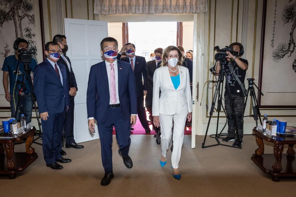 TAIPEI, TAIWAN - AUGUST 03: Speaker of the U.S. House Of Representatives Nancy Pelosi (D-CA), front right, arrives at the Legislative Yuan, Taiwan's house of parliament, with Tsai Chi-Chang, front left, Vice President of the Legislative Yuan on August 03, 2022 in Taipei, Taiwan. Pelosi arrived in Taiwan on Tuesday as part of a tour of Asia aimed at reassuring allies in the region, as China made it clear that her visit to Taiwan would be seen in a negative light. (Photo by Central News Agency via Getty Images)