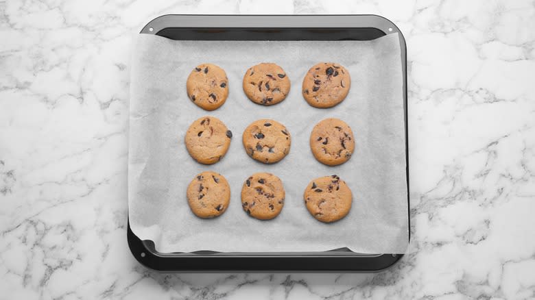 Cookies on parchment paper on baking sheet