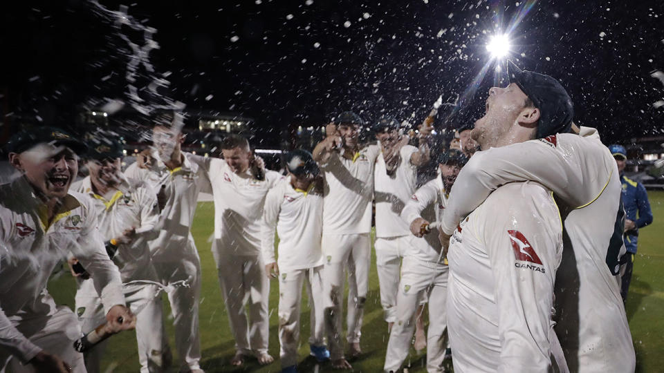 The Australian players, pictured here celebrating their Ashes triumph.