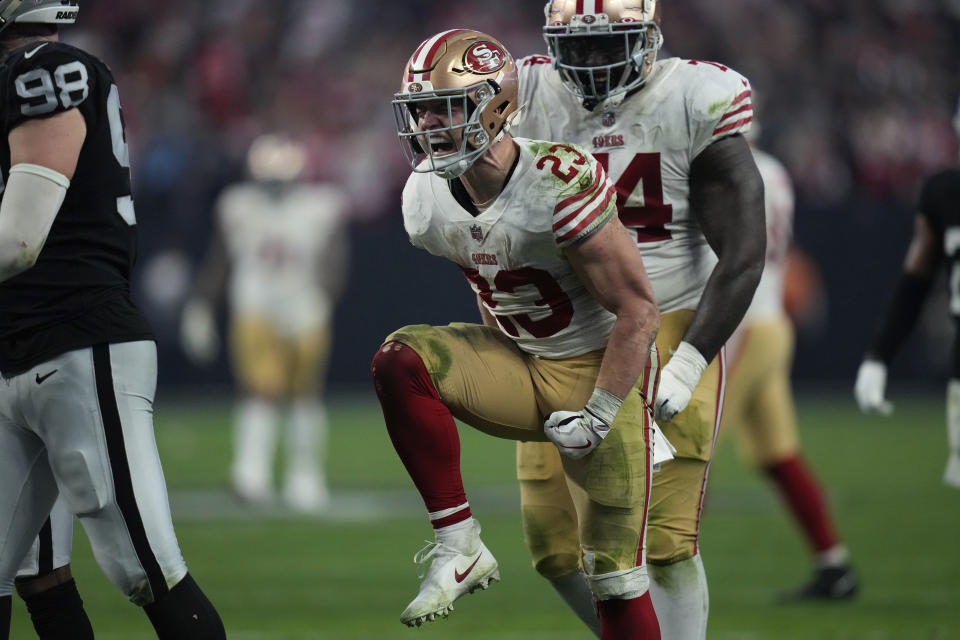 San Francisco 49ers running back Christian McCaffrey (23) celebrates after a run during the second half of an NFL football game between the San Francisco 49ers and Las Vegas Raiders, Sunday, Jan. 1, 2023, in Las Vegas. (AP Photo/John Locher)