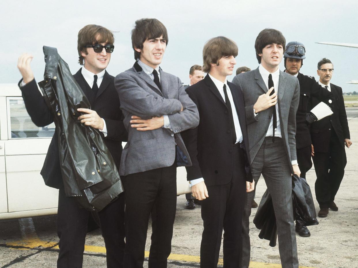 The Beatles arrive at Speke airport, Liverpool on July 10, 1964, for the Liverpool premiere of their movie
