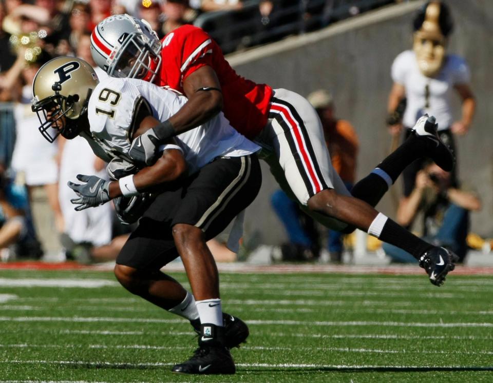 Ohio State's Malcolm Jenkins tackles Purdue's Aaron Valentin during a 2008 game.