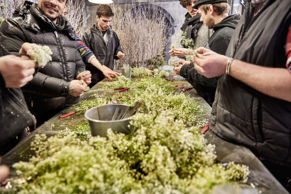 A team works together inside Chauvin’s Un Jour de Fleurs in Paris.