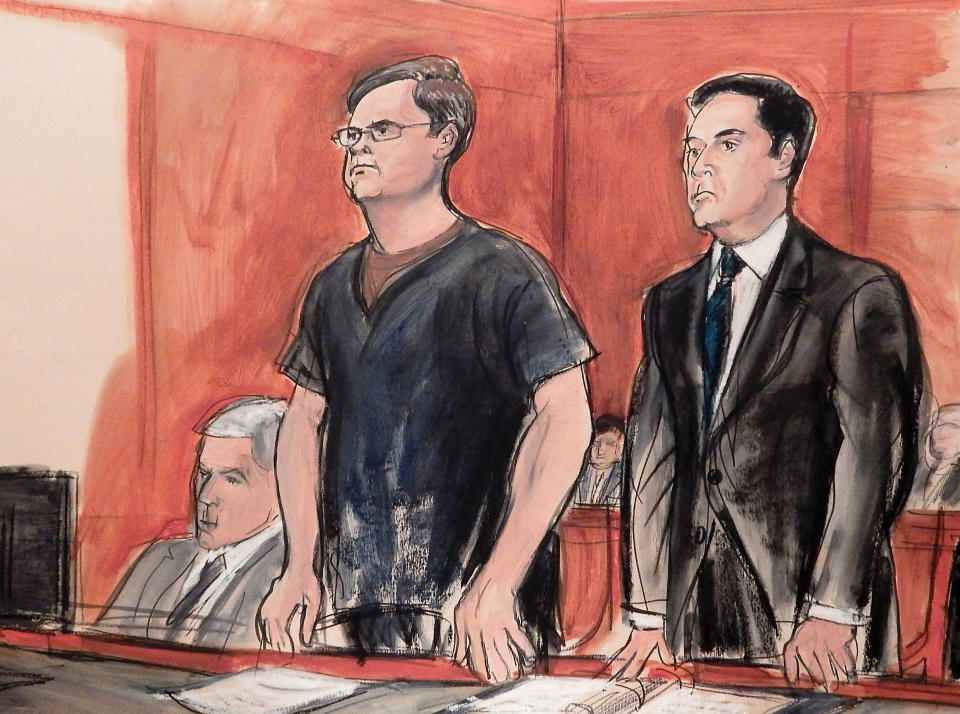 In this courtroom drawing, defendant Evgeny Buryakov stands with his attorney Scott Hershman during sentencing on espionage charges in New York on May 25, 2016. (AP Photo/Elizabeth Williams)