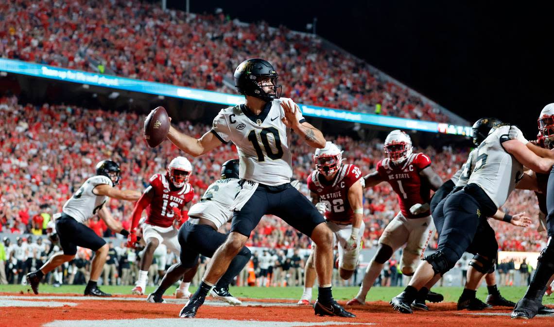 Wake Forest quarterback Sam Hartman (10) looks to pass during the second half of N.C. State’s 30-21 victory over Wake Forest at Carter-Finley Stadium in Raleigh, N.C., Saturday, Nov. 5, 2022.