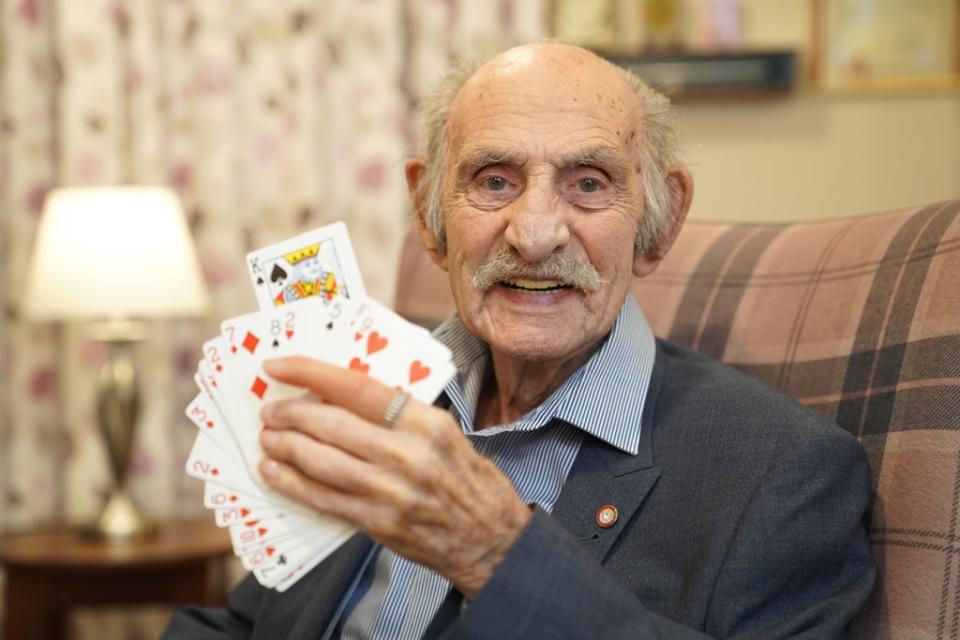 Mr Lewis at his home in north London after he was awarded an MBE in the New Year Honours list (Kirsty O’Connor/PA) (PA Wire)