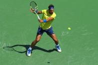 Aug 18, 2017; Mason, OH, USA; Rafael Nadal (ESP) returns a shot against Albert Ramos-Vinolas (ESP) during the Western and Southern Open at the Lindner Family Tennis Center. Aaron Doster-USA TODAY Sports