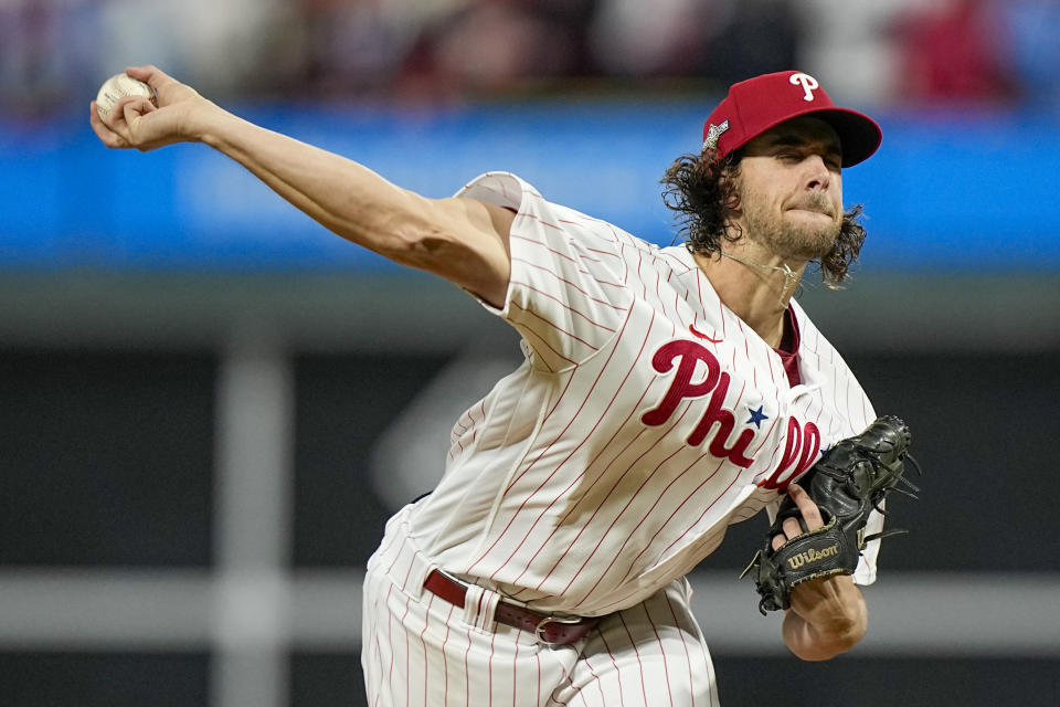 Philadelphia Phillies starting pitcher Aaron Nola throws against the Arizona Diamondbacks during the first inning in Game 2 of the baseball NL Championship Series in Philadelphia, Tuesday, Oct. 17, 2023. (AP Photo/Brynn Anderson)
