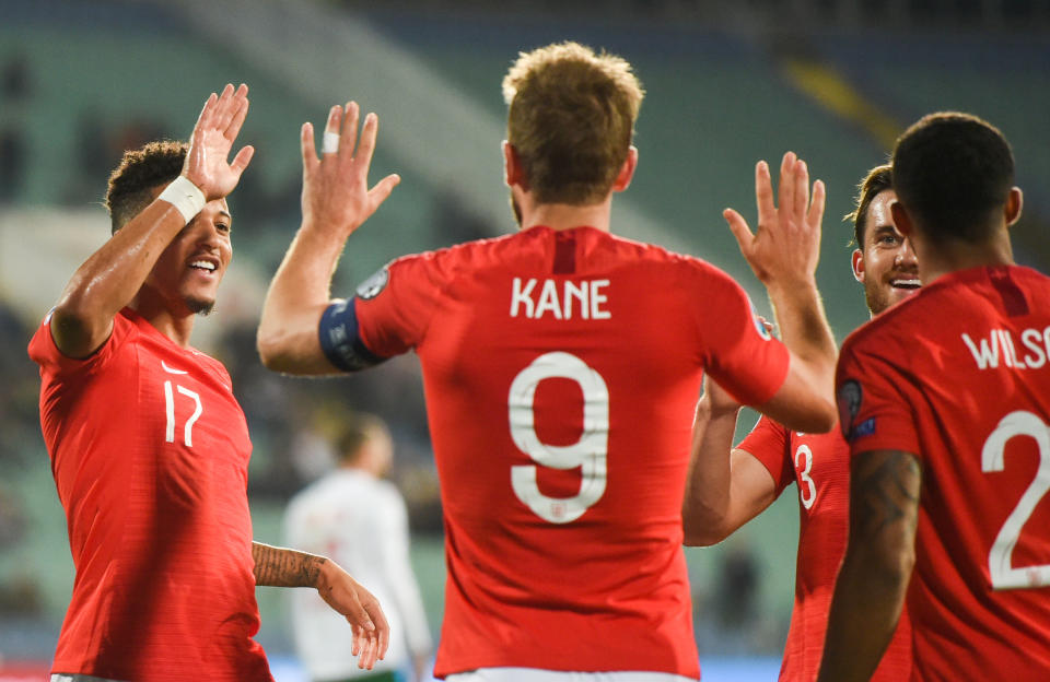 England's forward Harry Kane (C) celebrates with his teammates after scoring a goal during the Euro 2020 Group A football qualification match between Bulgaria and England at the Vasil Levski National Stadium in Sofia on October 14, 2019. (Photo by NIKOLAY DOYCHINOV / AFP) (Photo by NIKOLAY DOYCHINOV/AFP via Getty Images)