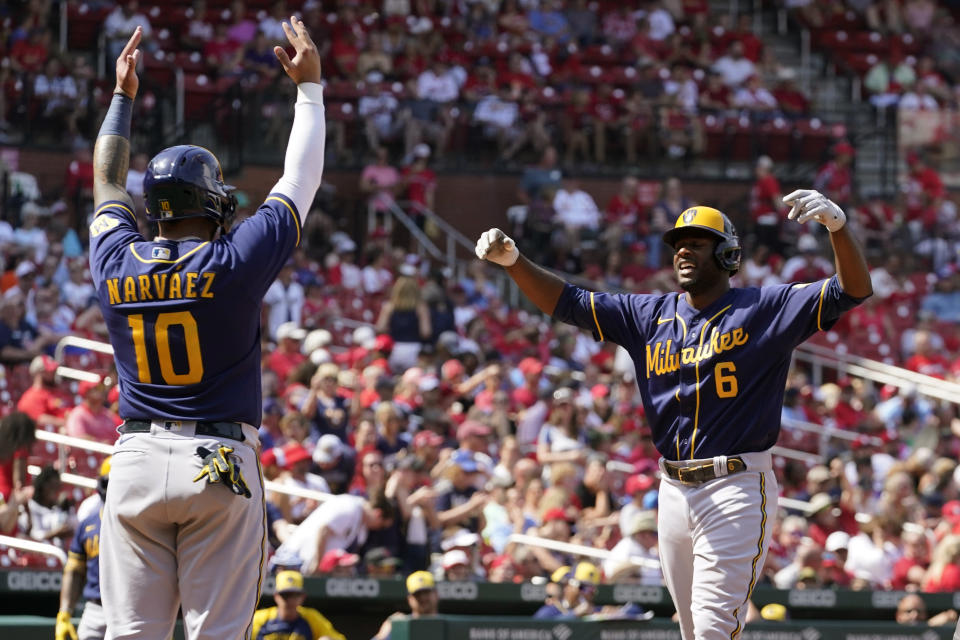 Milwaukee Brewers' Lorenzo Cain (6) is congratulated by teammate Omar Narvaez after hitting a two-run home run during the eighth inning of a baseball game against the St. Louis Cardinals Sunday, May 29, 2022, in St. Louis. (AP Photo/Jeff Roberson)