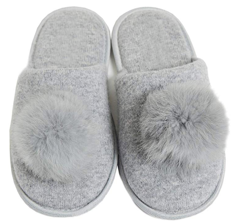 Cashmere slippers with a fur pom-pom? You deserve a pair too.  (Photo: Amazon)