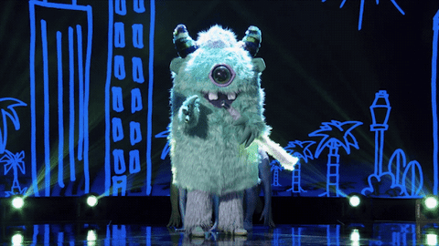 "I'm a monster because that's what the world labeled me," a rectangular, fuzzycyclops laments in the first episode of "The Masked Singer