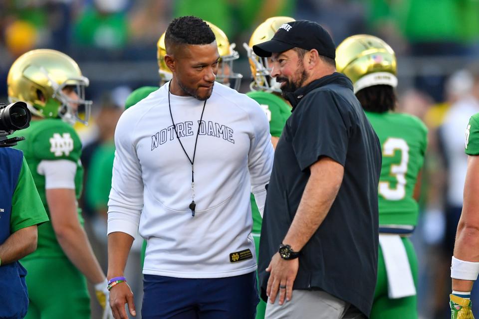 Sep 23, 2023; South Bend, Indiana, USA; Notre Dame Fighting Irish head coach Marcus Freeman and Ohio State Buckeyes head coach Ryan Day chat before the game at Notre Dame Stadium. Mandatory Credit: Matt Cashore-USA TODAY Sports