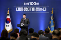 South Korean President Yoon Suk Yeol delivers a speech during a news conference to mark his first 100 days in office at the presidential office in Seoul, South Korea, Wednesday, Aug. 17, 2022. Yoon said Wednesday his government has no plans to pursue its own nuclear deterrent in the face of growing North Korean nuclear threats, as he urged the North to return to dialogue aimed at exchanging denuclearization steps for economic benefits. (Chung Sung-Jun/Pool Photo via AP)