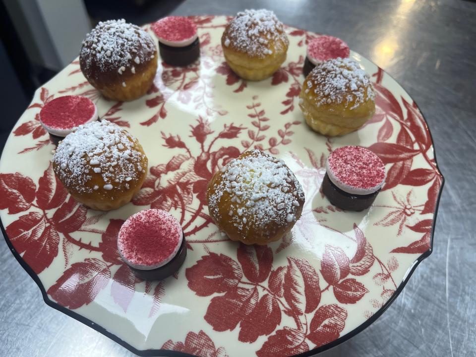 A tray of delicate pastry desserts.