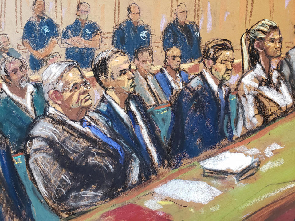 A courtroom sketch showing Bob Menendez, left, Nadine Menendez, right, and their lawyers between them (Jane Rosenberg/AP file)