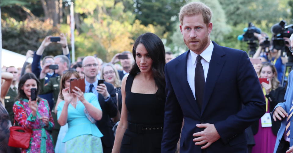 The Duchess of Sussex made her third outfit change of the day and donned a chic sleeveless dress for the summer garden party [Photo: Twitter]