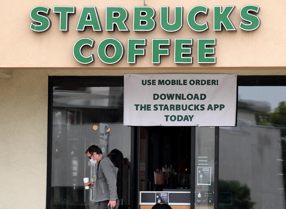 Starbucks workers around the country say they wish the coffee chain wasn&rsquo;t opening its doors yet. (Photo: Harry How via Getty Images)