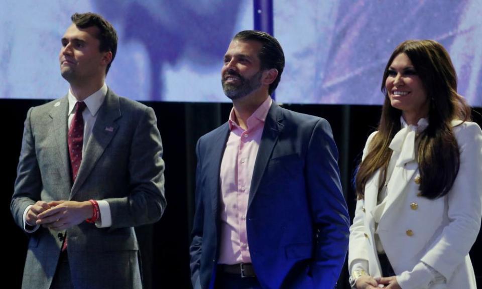 Charlie Kirk, founder of Turning Point USA, left, with Donald Trump Jr and his girlfriend, Kimberly Guilfoyle, at a summit in 2019.