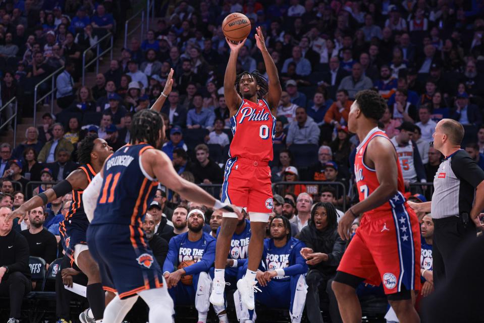 Philadelphia 76ers guard Tyrese Maxey (0) shoots the ball in front of New York Knicks guard Jalen Brunson (11) during the first half of Game 2 of the first round for the 2024 NBA playoffs at Madison Square Garden.