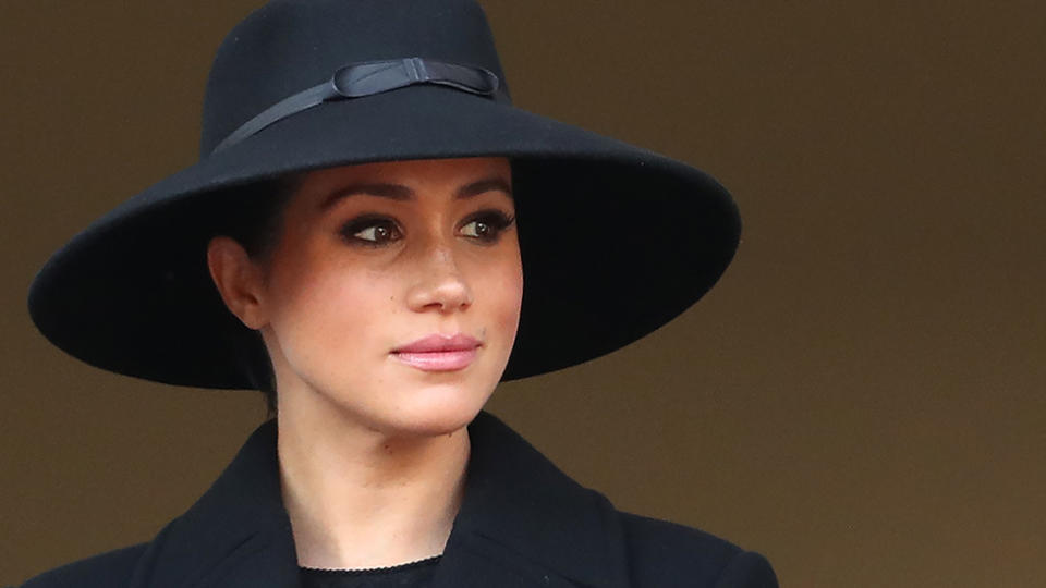 Meghan Markle dressed in black