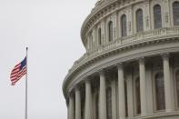 The U.S. Capitol during a morning rainstorm, after Congress agreed to a multi-trillion dollar economic stimulus package created in response to the economic fallout from the COVID-19 Coronavirus, on Capitol Hill in Washington