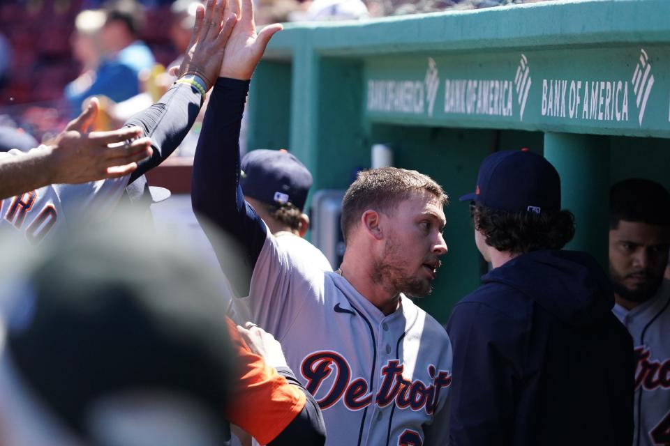 Detroit Tigers left fielder JaCoby Jones (21) reacts after scoring on a sacrifice out by center fielder Akil Baddoo (60) (not pictured) against the Boston Red Sox in the third inning May 6, 2021 at Fenway Park.