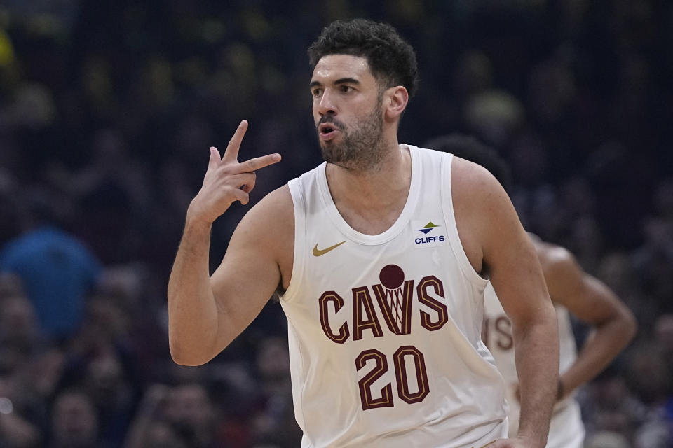 Cleveland Cavaliers forward Georges Niang gestures after a 3-point basket in the first half of an NBA basketball game against the Chicago Bulls, Monday, Jan. 15, 2024, in Cleveland. (AP Photo/Sue Ogrocki)