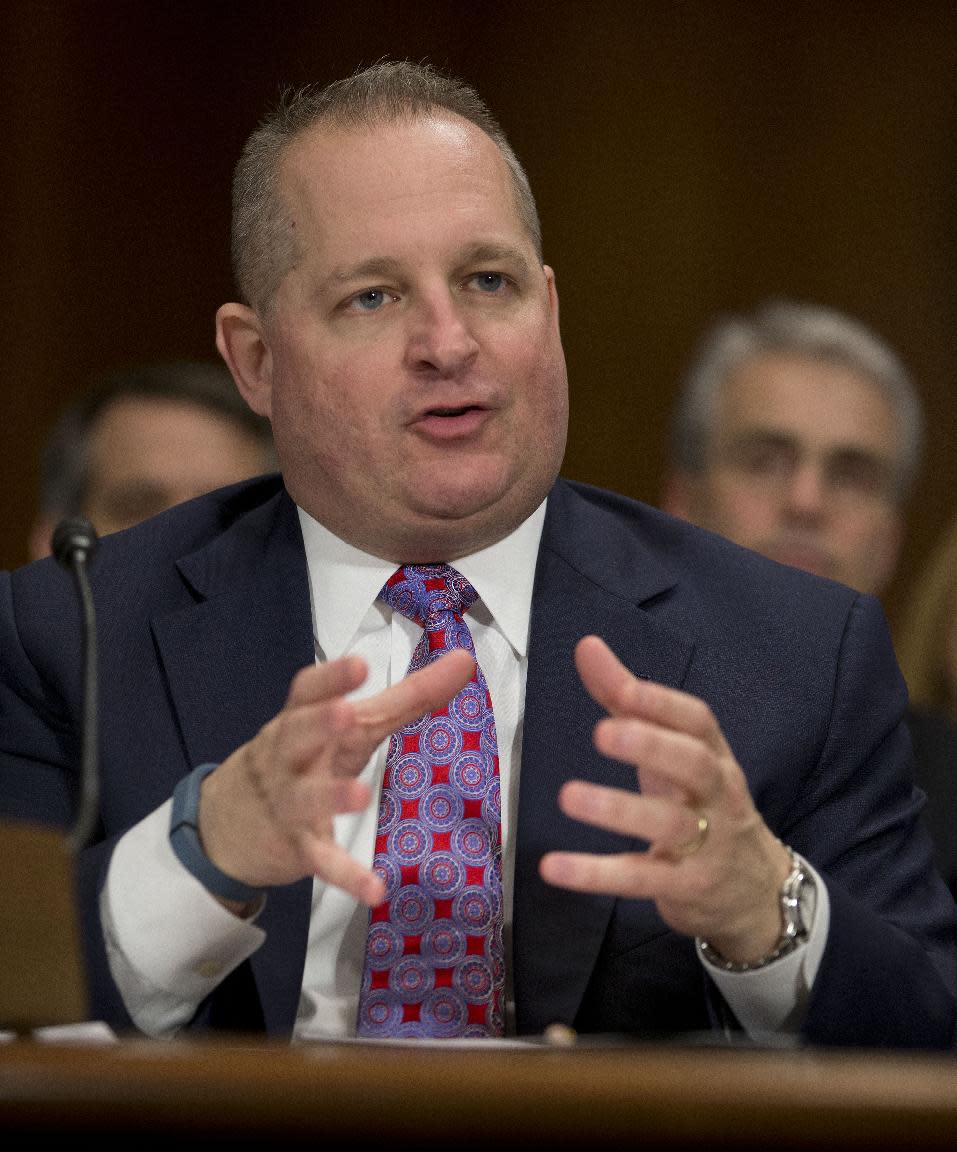 John J. Mulligan, executive Vice President and Chief Financial Office of the Target Corporation testifies on Capitol Hill in Washington, Tuesday, Feb. 4, 2014, before the Senate Judiciary Committee hearing on data breaches and combating cybercrime . (AP Photo/Pablo Martinez Monsivais)