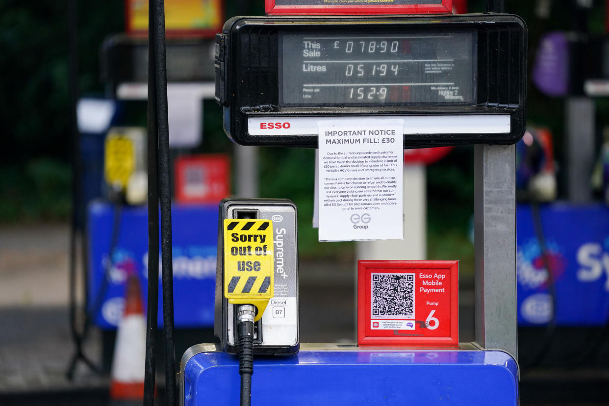 Fuel pumps are out of use at a deserted Esso petrol station forecourt in Solihull, Birmingham. Picture date: Monday September 27, 2021.