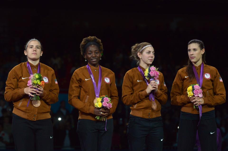 Team USA celebrates with the bronze meda