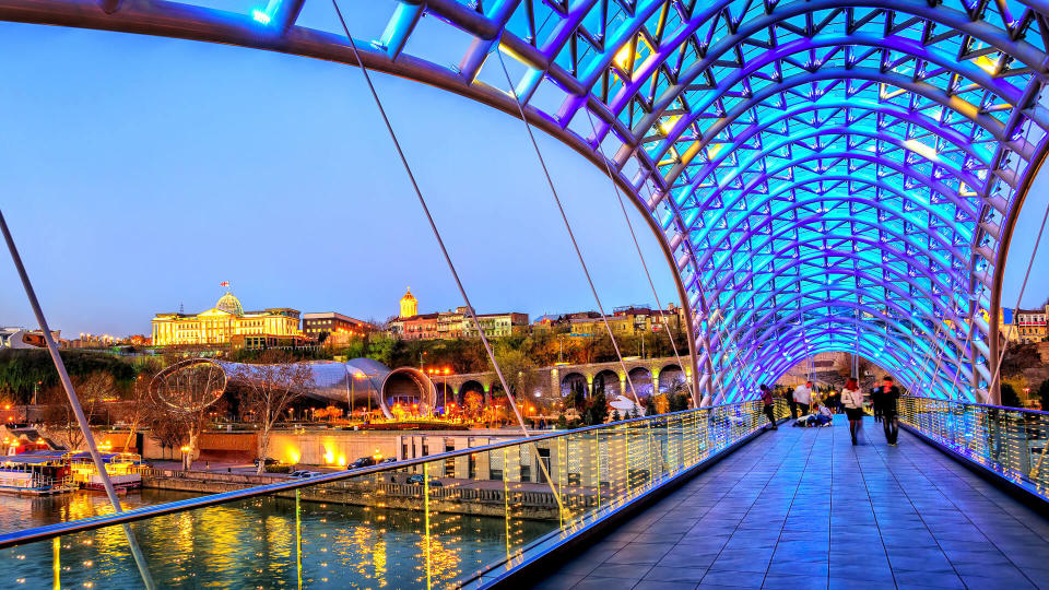 Peace Bridge overlooking Trinity Cathedral in Tbilisi Georgia