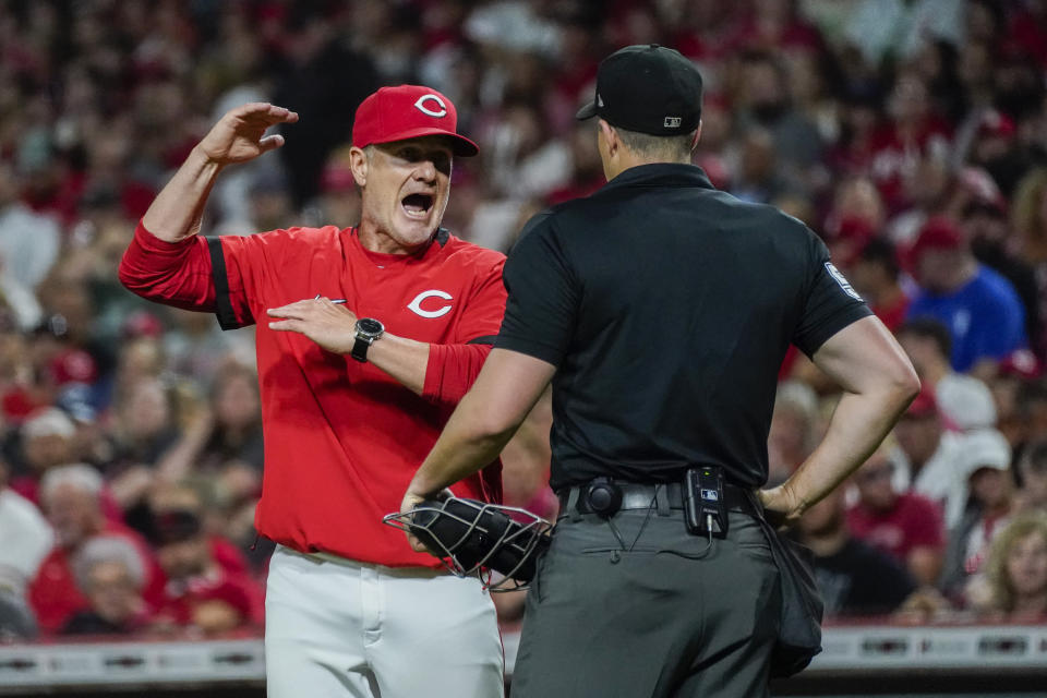 Cincinnati Reds manager David Bell, left, argues with umpire Brennan Miller, right, during the fourth inning of a baseball game against the St. Louis Cardinals, Saturday, Sept. 9, 2023, in Cincinnati. (AP Photo/Joshua A. Bickel)