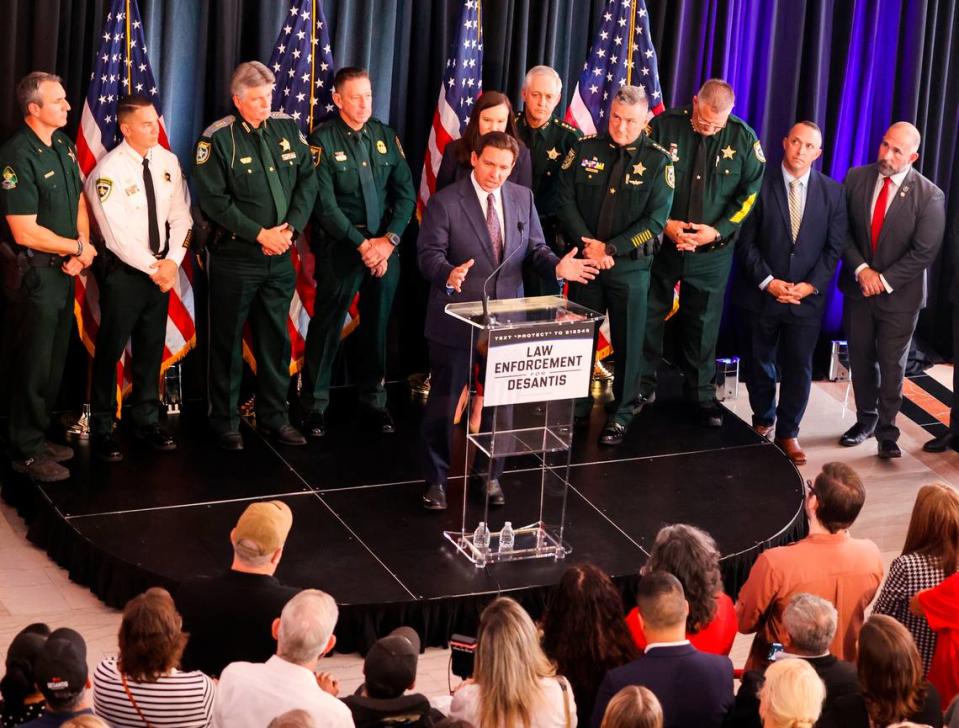 Gov. Ron DeSantis addresses the audience while on stage along with law enforcement leaders during a campaign event on Thursday, Oct. 5, 2023 in Tampa.
