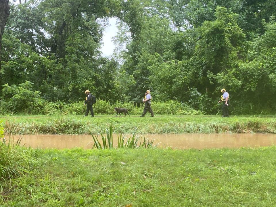 Rescue crews search along the Delaware canal path running parallel to Taylorsville Road in Upper Makefield on Sunday July 16, 2023