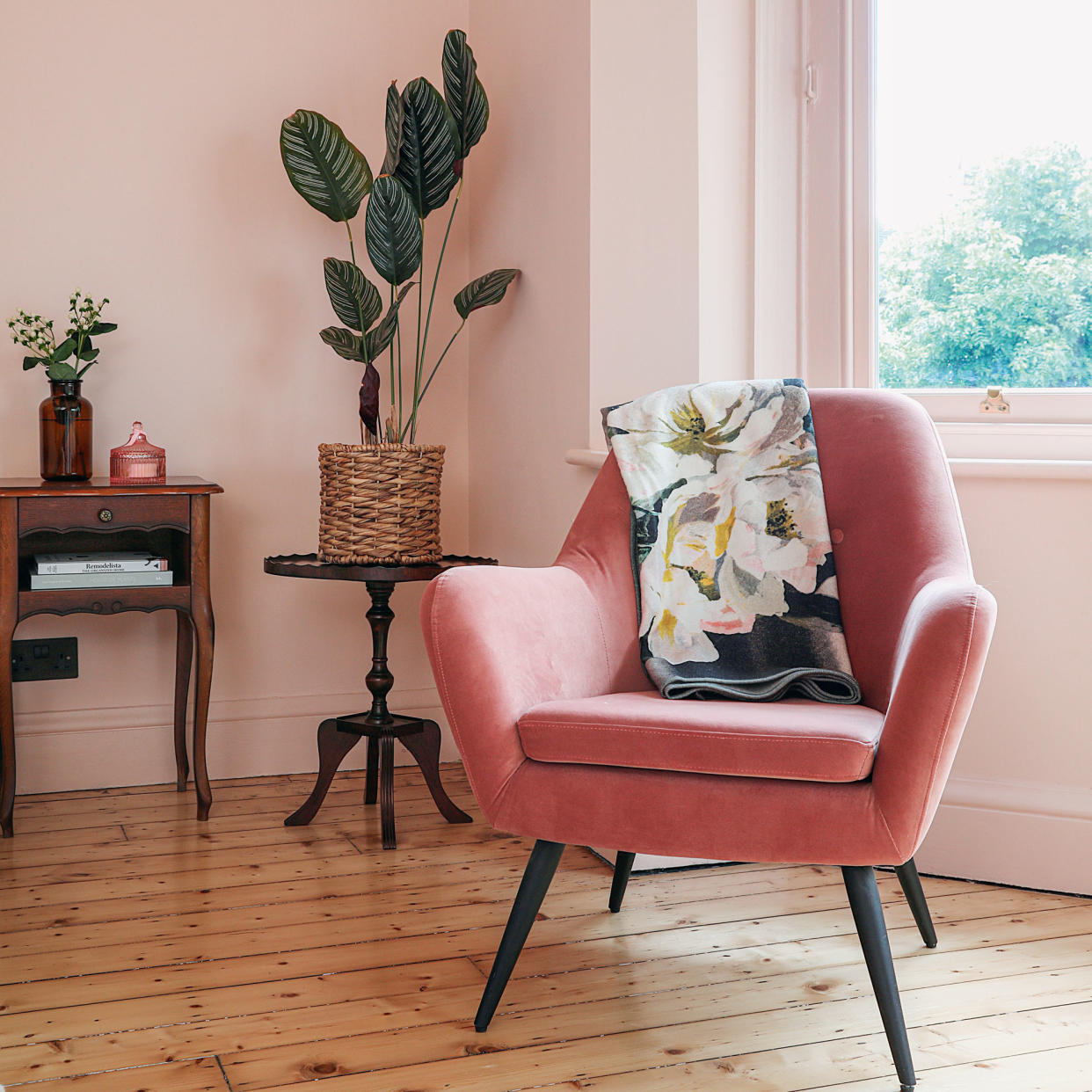  Pink occasional chair by window in pale-pink painted bedroom 