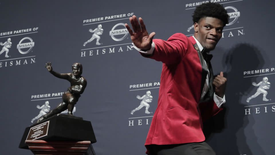 Jackson poses with the Heisman Trophy after winning the award in 2016. - Julie Jacobson/AP