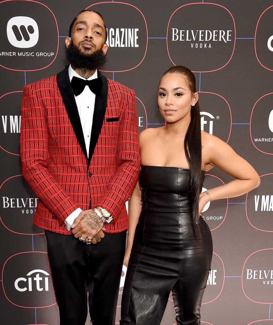 Nipsey Hussle and Lauren London arrive at the Warner Music Group Pre-Grammy Celebration on February 7, 2019 in Los Angeles.