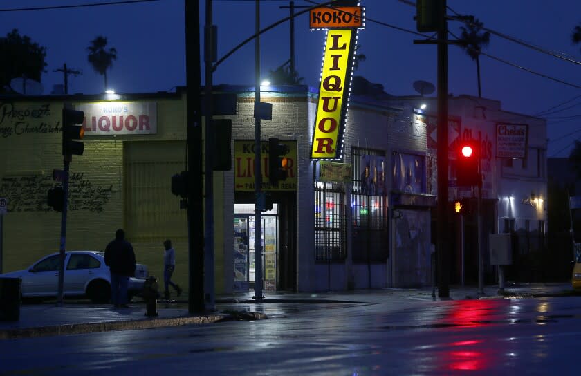 LOS ANGELES, CALIF. - APR. 9, 2020. Dusk descends on the intersection of 51st and Figueroa streets in South Los Angeles where the highest number of prostitution-related arrests in the city are made. (Luis Sinco/Los Angeles Times)