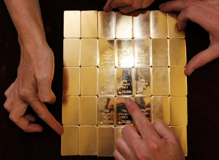 Gold is a safe haven that investors turn to in times of turmoil and to hedge against falling interest rates (JOE KLAMAR)
