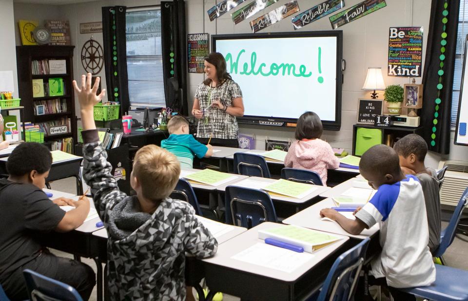 Boley Elementary School fourth grade teacher Brittani Durand speaks to her class on the first day of school at the temporary location of the school in West Monroe, La. on Aug. 14, 2019. The original location of the school burned in a fire on April 13.